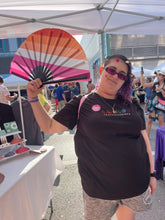 Load image into Gallery viewer, Person wearing LGBTQ inclusivititty shirt at an event