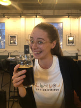 Load image into Gallery viewer, Woman wearing Inclusivititty shirt at a bar
